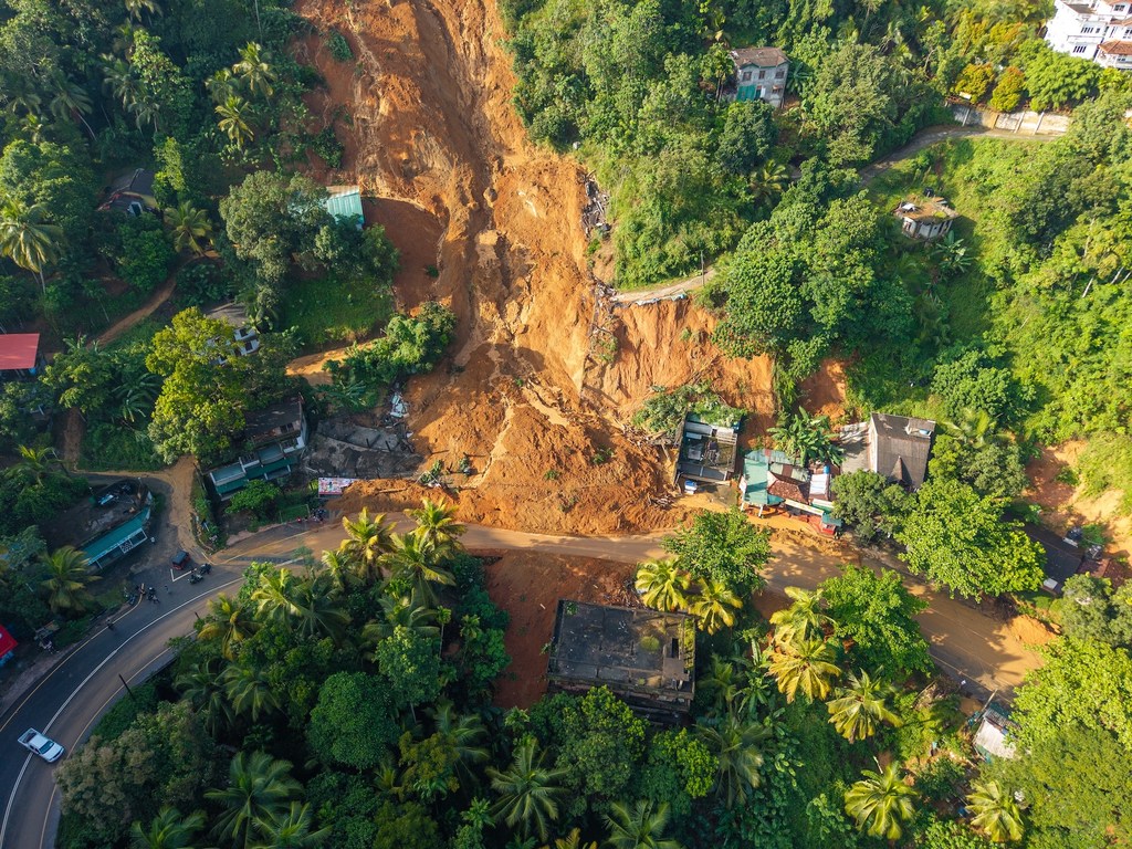 Cyclone Ditwah triggered landslides in several parts of Sri Lanka, destroying roads and cutting off towns and villages. Pictured here, destroyed houses and shops in Uthuwankanda.